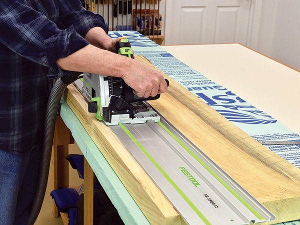 Making a cut on a long panel with a track saw