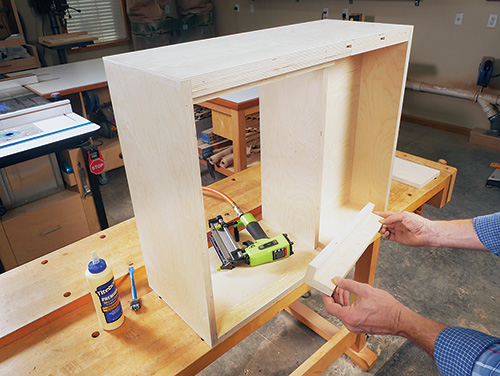 Attaching upper block to tool cabinet cabinet