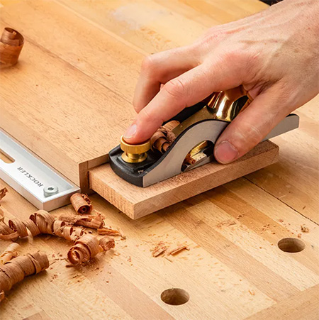 Smoothing a tenon with a Bench Dog block plane