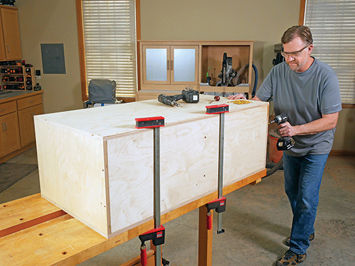 Adding back panel to tool cart carcass