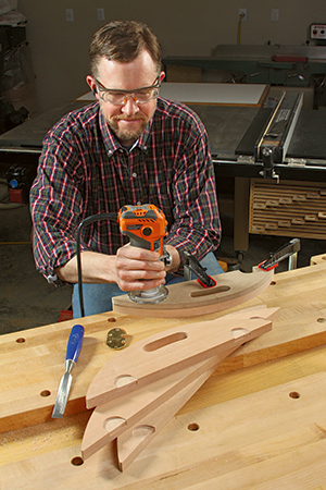 Finishing cutting hinge recesses with handheld router