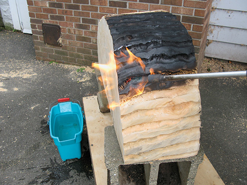 Finishing cottonwood table with flame in shou sugi ban finish