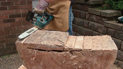 Making rough cuts for cottonwood table with a chainsaw