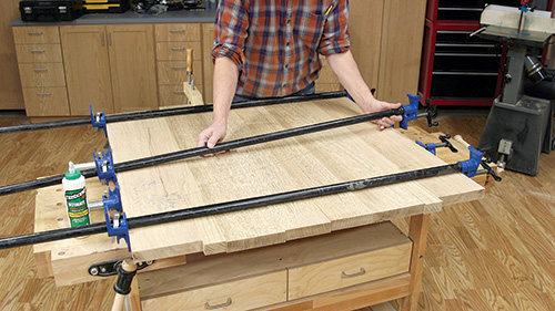 Clamping cloud lift tabletop with pipe clamp