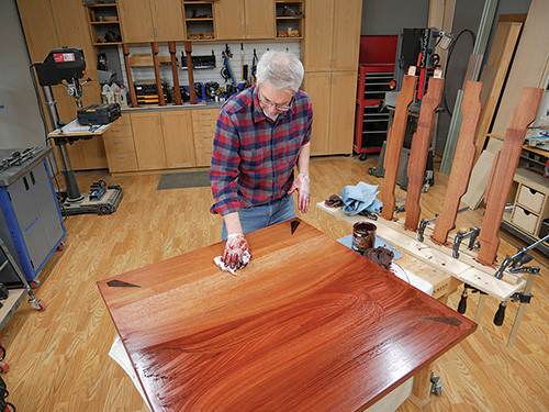 Wiping finish onto dining table tabletop