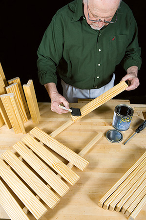 Finishing compact bench slats with salad bowl oil