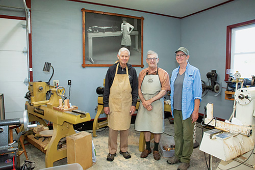 Ernie Conover and students with a Conover lathe