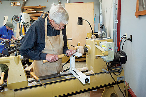 Conover student John Gibbon demonstrating lathe turning technique