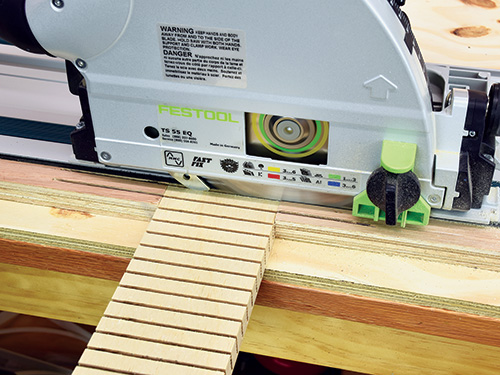 View of series of kerf cuts made by track saw