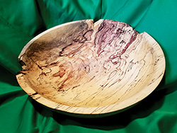 Turned bowl with damaged edges