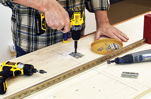 Installing hinges on drill press cabinet door