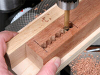 Using a drill press to cut out mortises