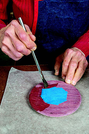 Glue the petals and lid before the sealer coat of shellac is applied.