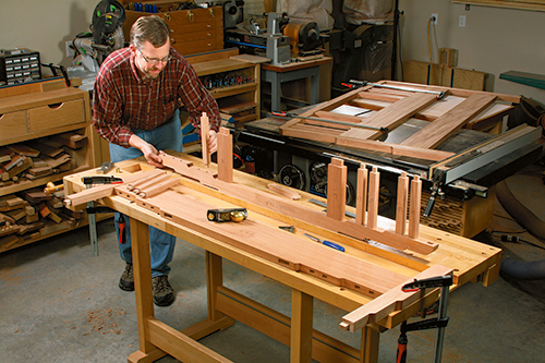 You may need to take a few shavings off of the slat and stile tenons so they fit their mortises well. Then carry out a full dry-assembly of the headboard and footboard. Label the parts to help keep their arrangement clear.