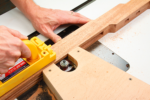 This short fence jig made it possible to cut panel grooves along the inner edges of the top rails where a long, straight fence couldn’t work. It also allowed the slot cutter to be projected in stages for making deeper cuts.