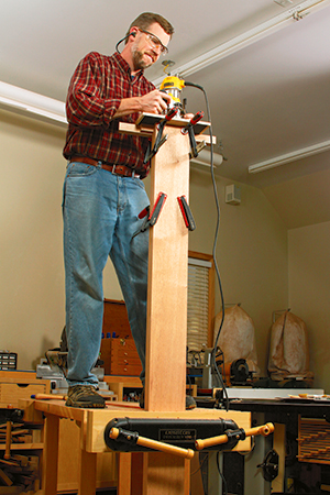 Routing mortises into the ends of the long bed rails required clamping them onend in a bench vise. Double them up to provide better support for the mortising jig.