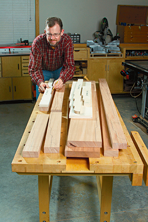 Trace the template shapes onto mahogany blanks for the rail and leg workpieces. Leave a few extra inches of material at the ends of the top rails to reinforce them for mortising, later.