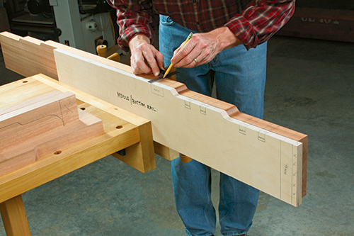 Mark the stile and slat mortises on the rails, transferring their locations from the templates.