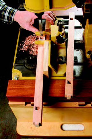 Chop 1/2" x 1/2" mortises 1/4" deep into the top and middle front rails for the full slats. The half slats have no tenons that would need mortises.