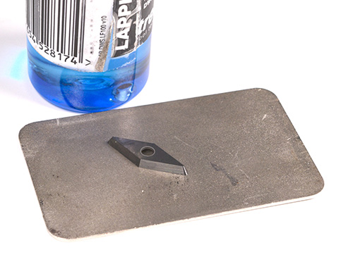Diamond card for sharpening a carbide scraper