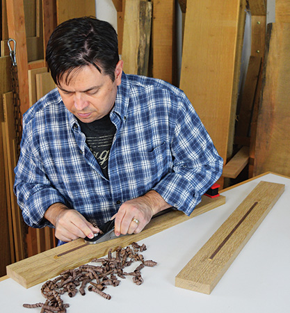 Plaining inlay strip on Limbert hutch legs