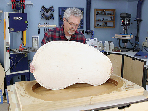 Laying core panel into epoxy pour mold