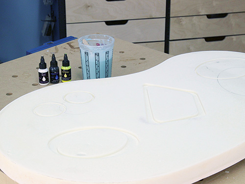 Tabletop with inlays designed to be filled with colored epoxy