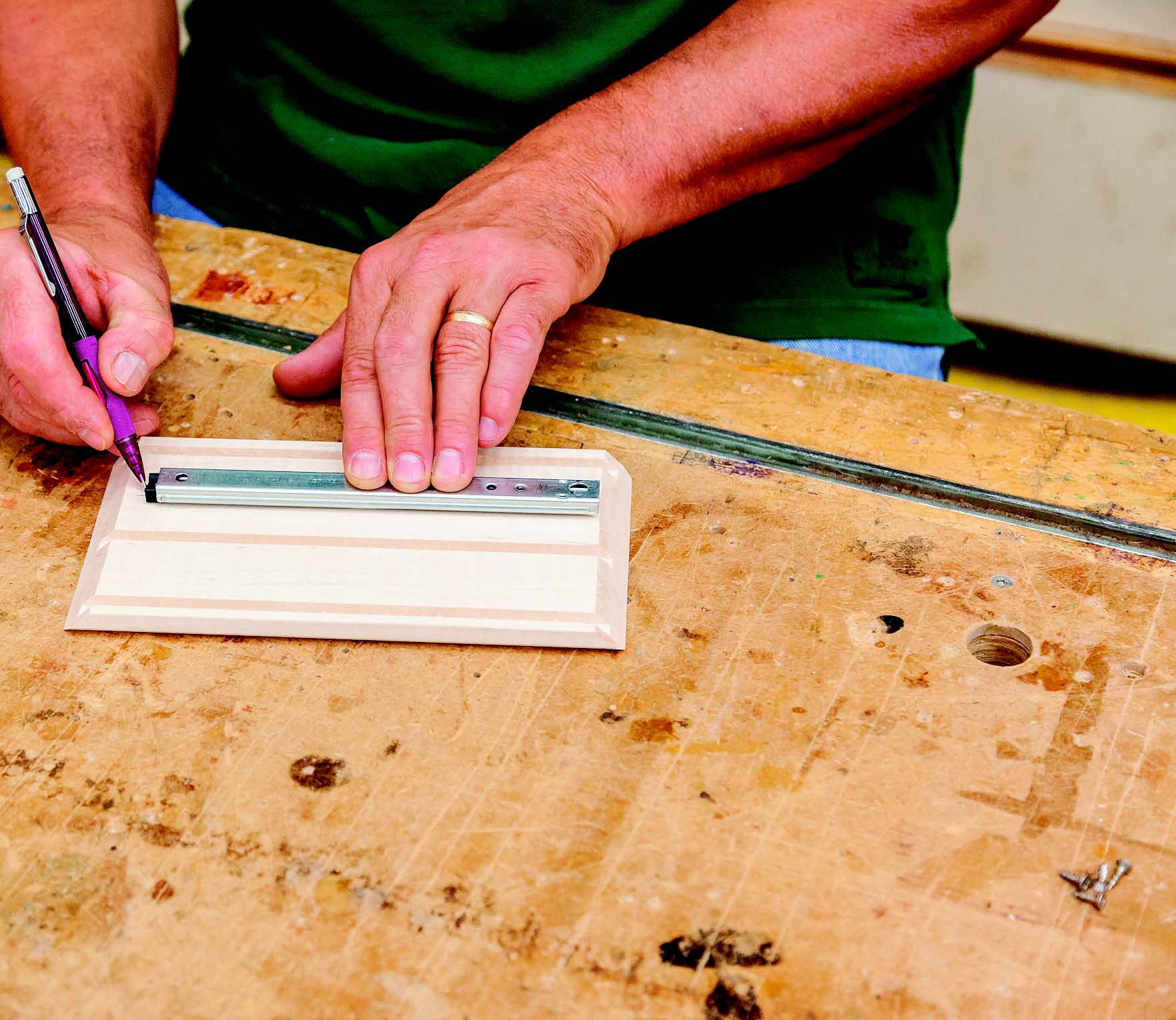 Position the mini drawer slides on the case sides, entered between the bottom panel and middle tray grooves. Mark their back ends