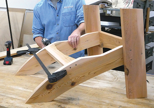 Clamping and screwing together pieces of Adirondack chair base