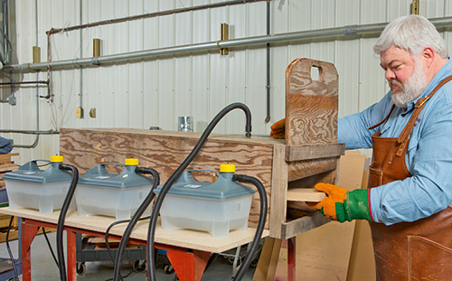 Inserting board into steam bending process