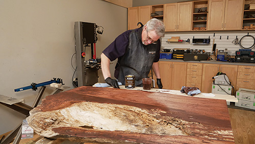 Applying stain to maple slab tabletop