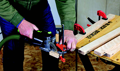 Clamping a stop block to the Domino's fence positions frame stiles for slotting