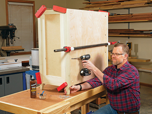 Installing back panel in shaker cabinet