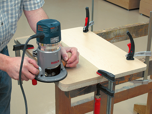 Rounding edges and corners of dresser top with router