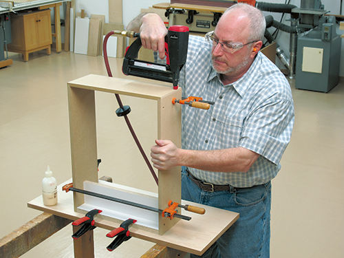 Fastening dresser drawer framework with nail gun