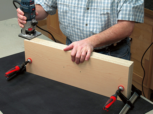 Trimming drawer corners with handheld router