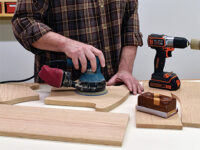 Sanding a panel with a random orbit sander