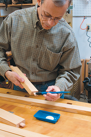 Gluing up Dominos in frame before assembly