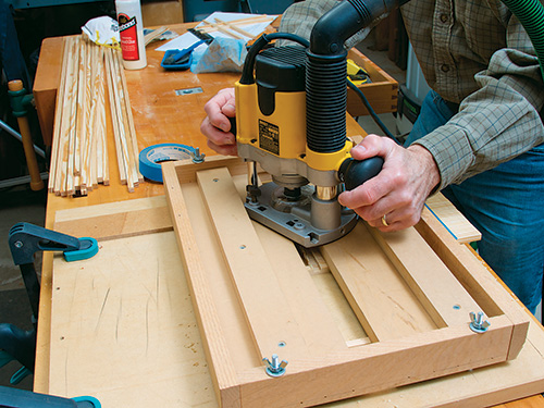 Using router and jig to cut out lattice strip dadoes