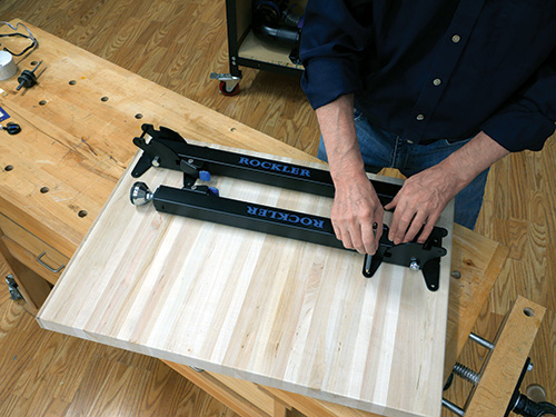 Laying out leg brackets for installation on butcher block