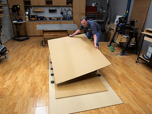 Laying down cardboard seperator