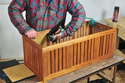 A pin nailer with 1/2” pins secured the backing panels into their frame openings. The “good” side of each panel is covered in black vinyl.