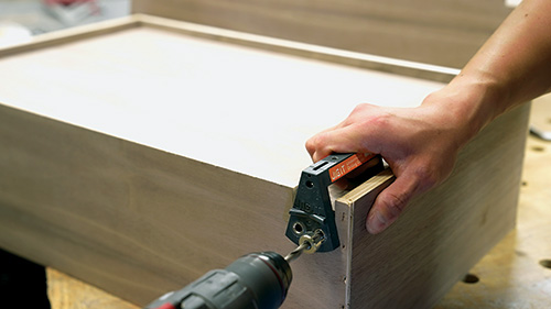 Drilling holes for undermount drawer slide installation