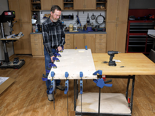 Clamping plywood desk panels together during glue-up