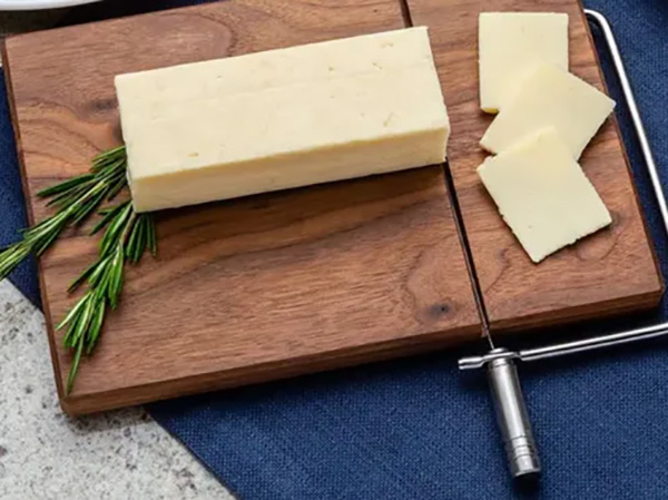 Cutting a cheese block with Rockler cheese slicer hardware